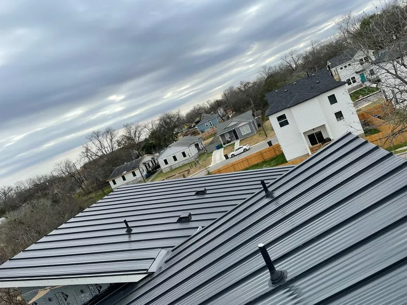 Standing seam metal roof panels with vents for Skylight Repair in Cleveland
